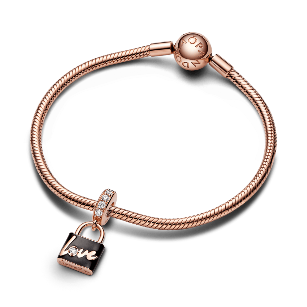 Piekarināmais rozā slēdzenes amulets