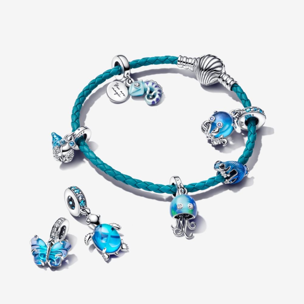 Metāliski zils gekona amulets