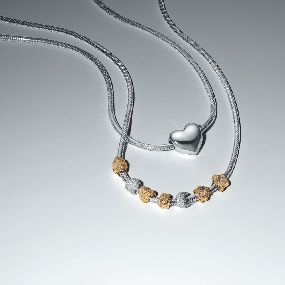 Teksturēts Hamsa rokas amulets