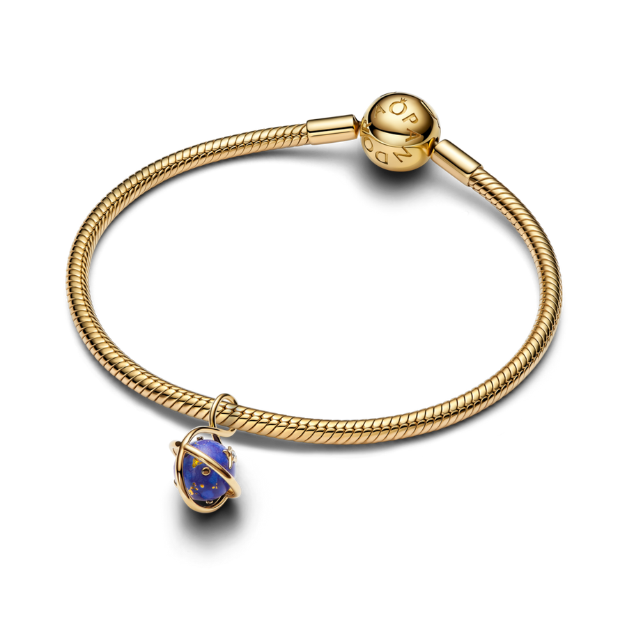 Rotējošas kosmiskās zilās planētas amulets