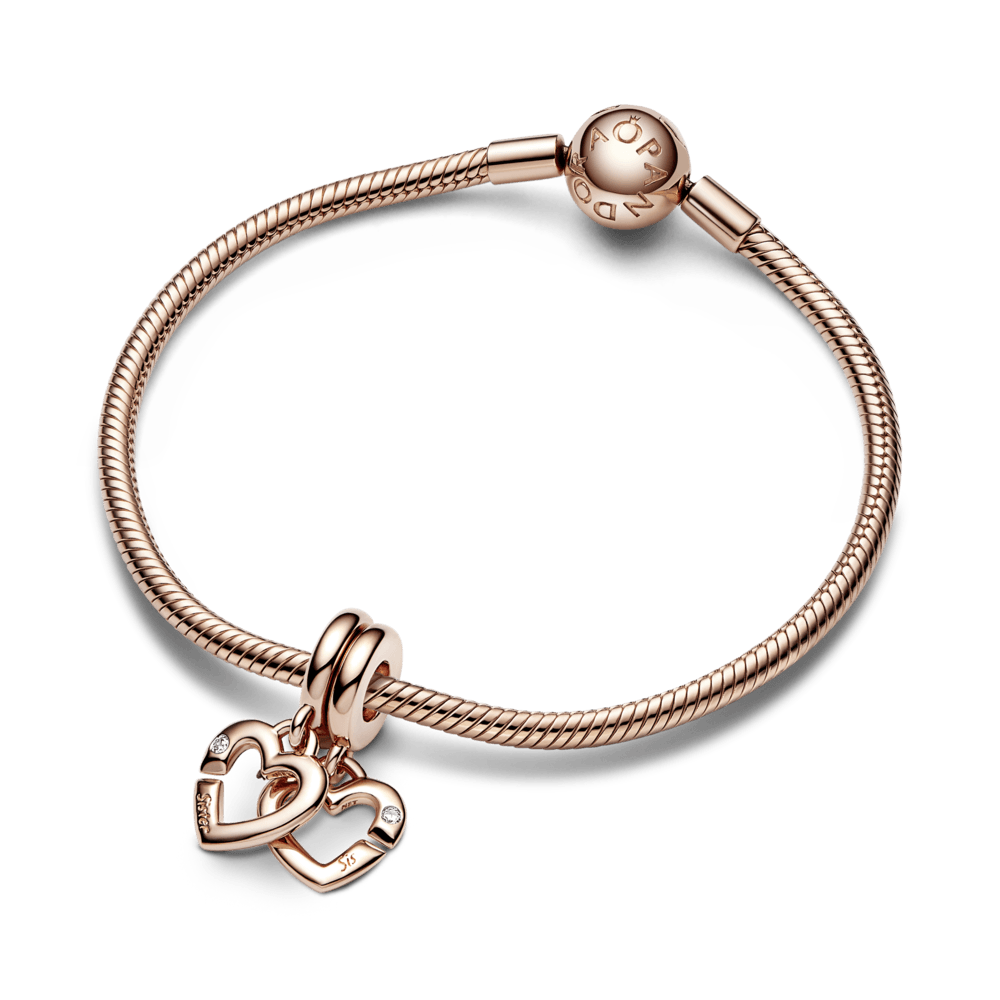 Piekarināmais dalītās sirds amulets ar māsu motīvu