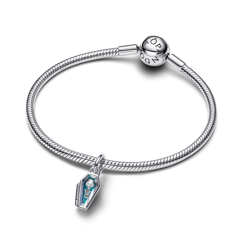 Tumsā spīdoša atverāma zārka amulets