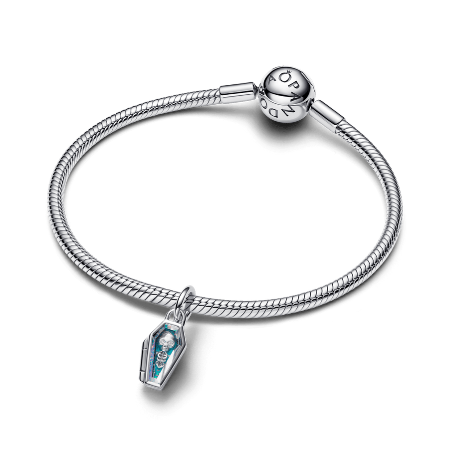 Tumsā spīdoša atverāma zārka amulets