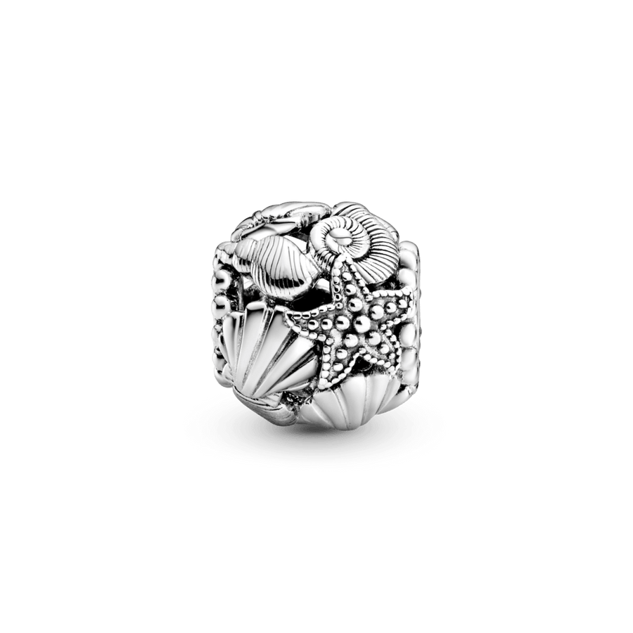 Ažūra rakstā veidots jūraszvaigznes, gliemežvāku un sirsniņu amulets