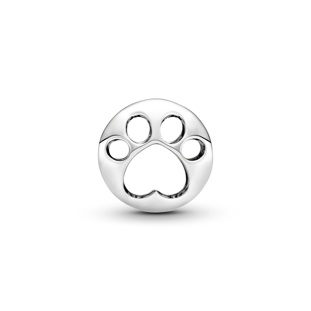 Ažūra rakstā veidots ķepas nospieduma amulets