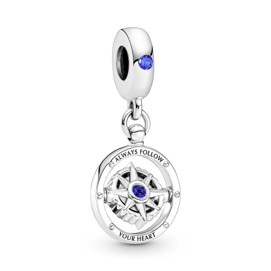 Piekarināmais rotējošā kompasa amulets