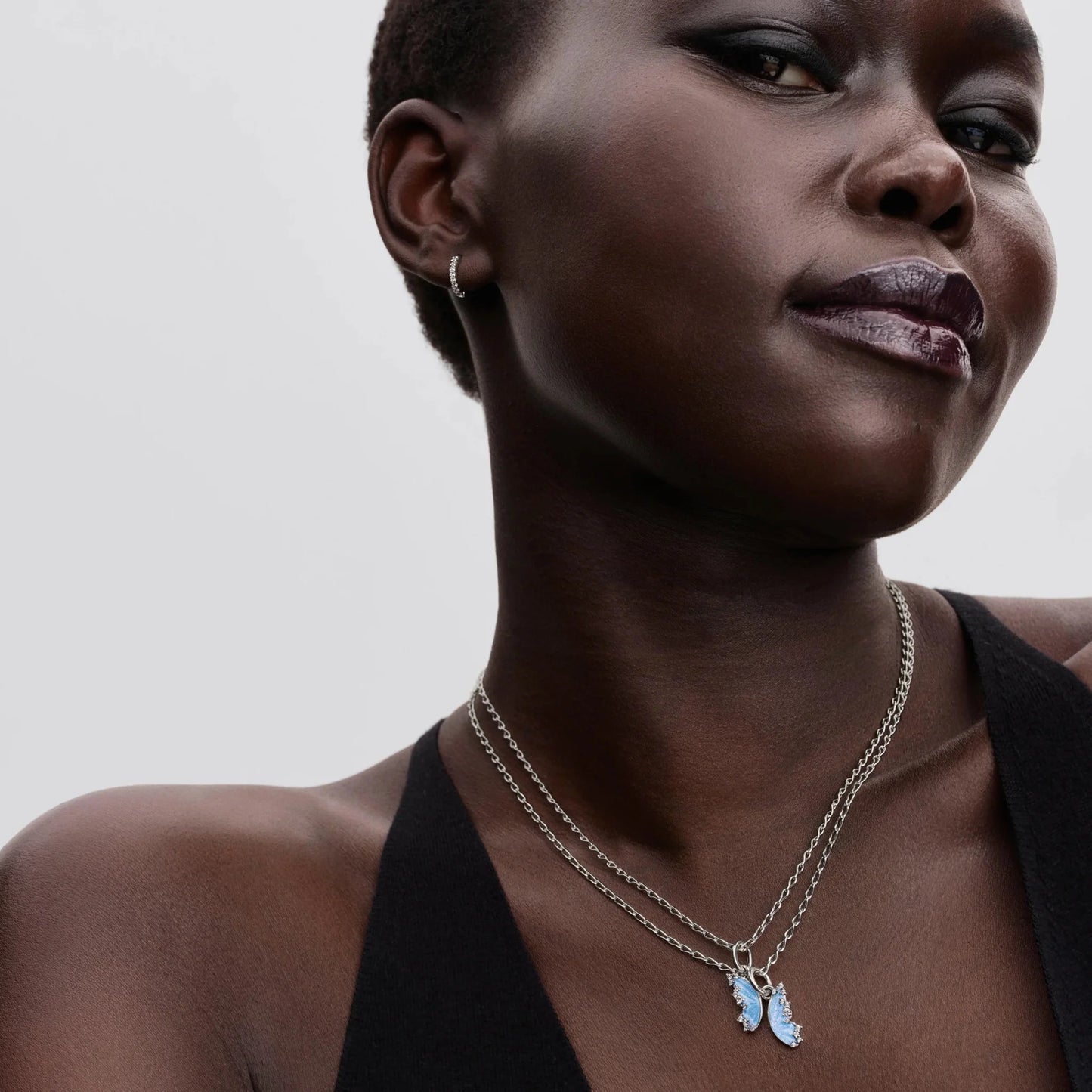 Atdalāmais tauriņa amulets