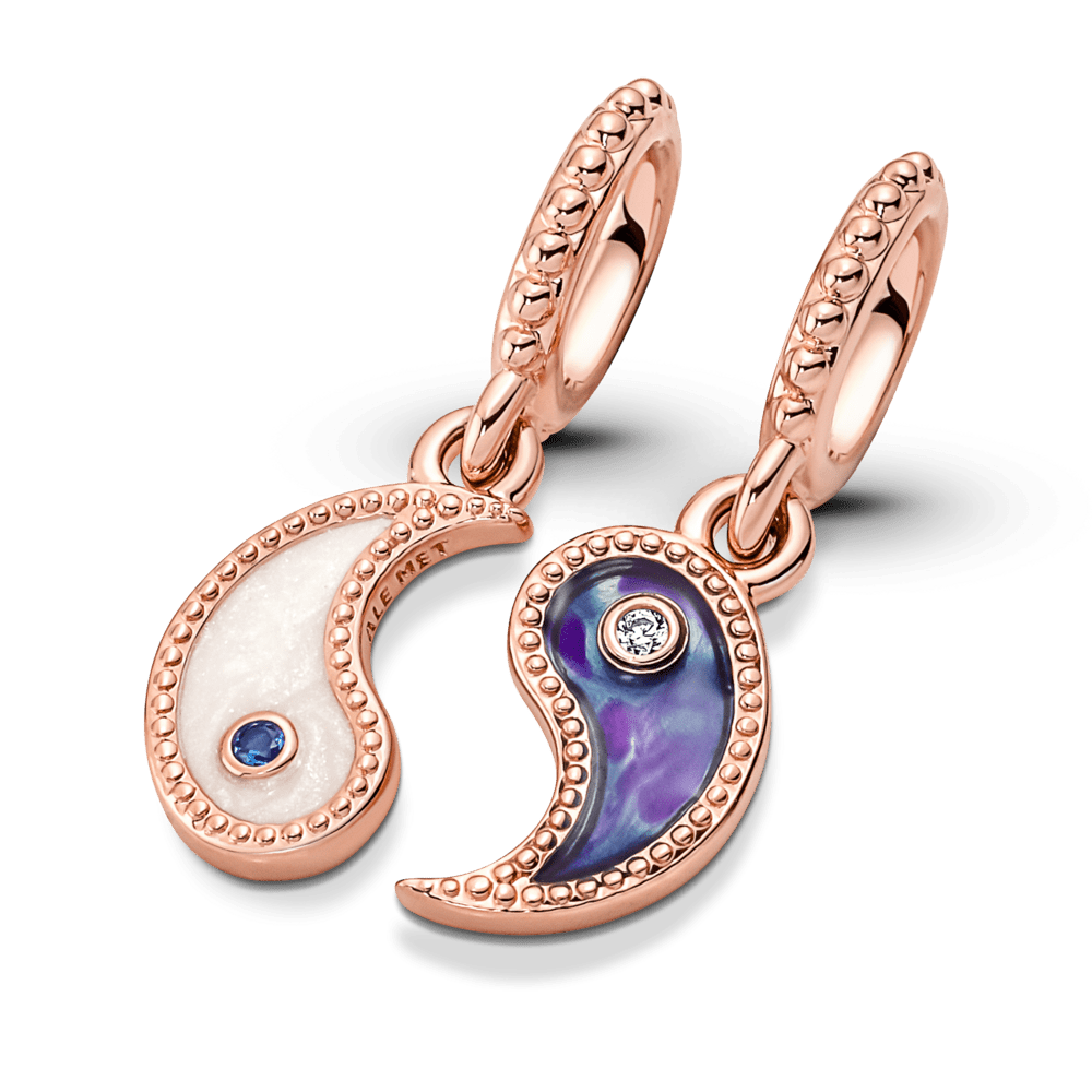 Piekarināmais amulets ar mirdzošu un sadalāmu jiņ un jaņ amuletu