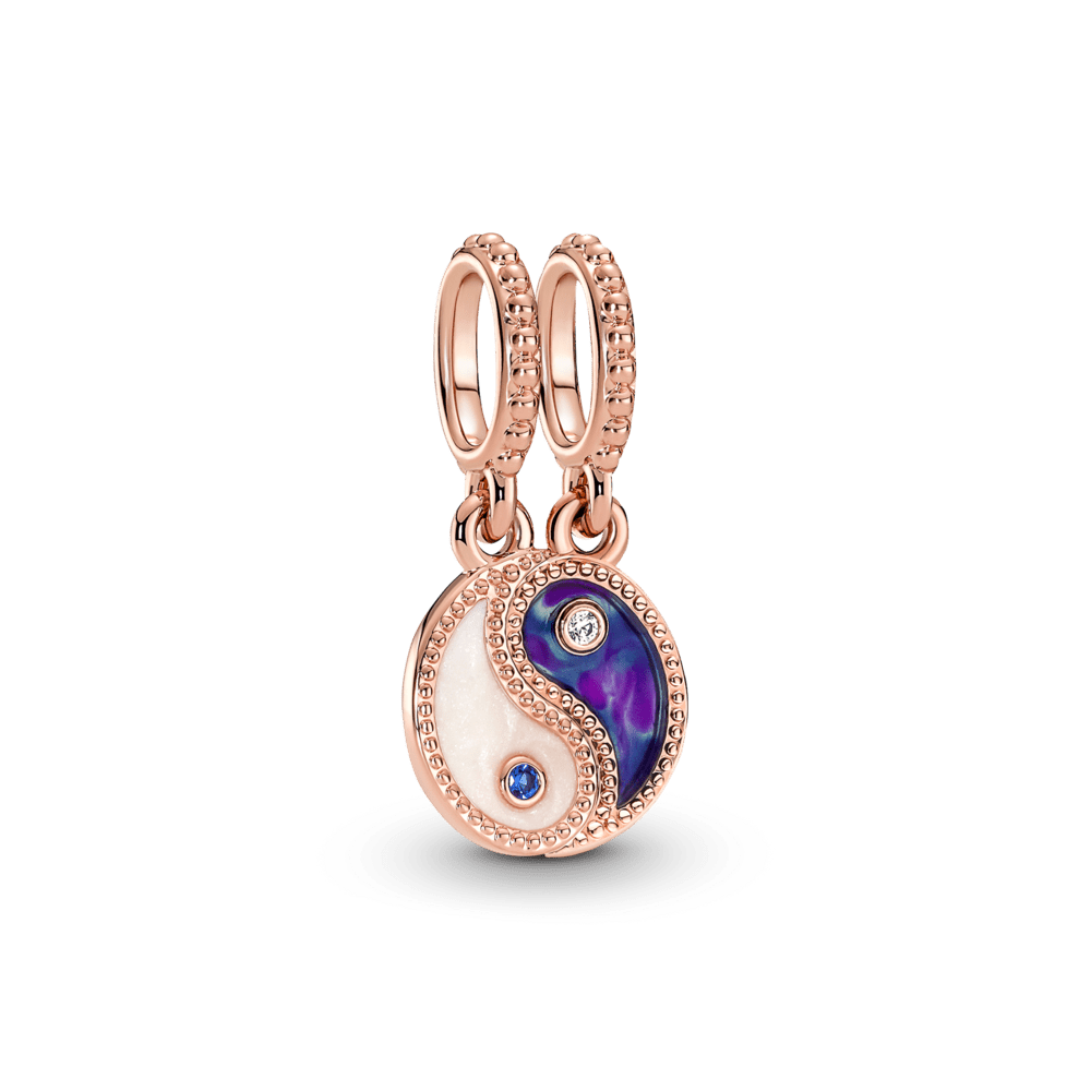 Piekarināmais amulets ar mirdzošu un sadalāmu jiņ un jaņ amuletu