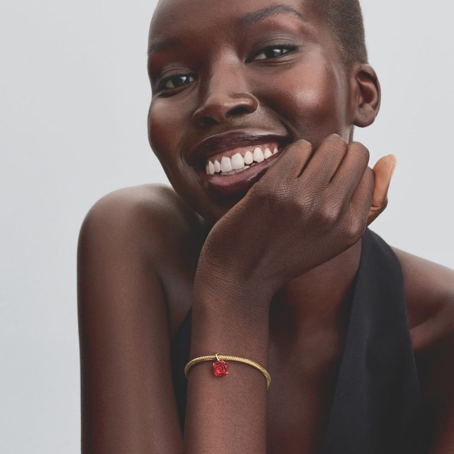 Disney skaistules un briesmoņa apburtās rozes amulets