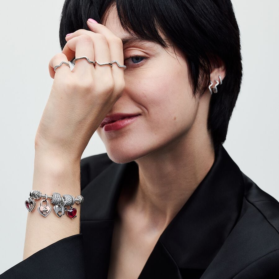 Divtoņu pagriežāmās sirds slēdzenes dubultais amulets