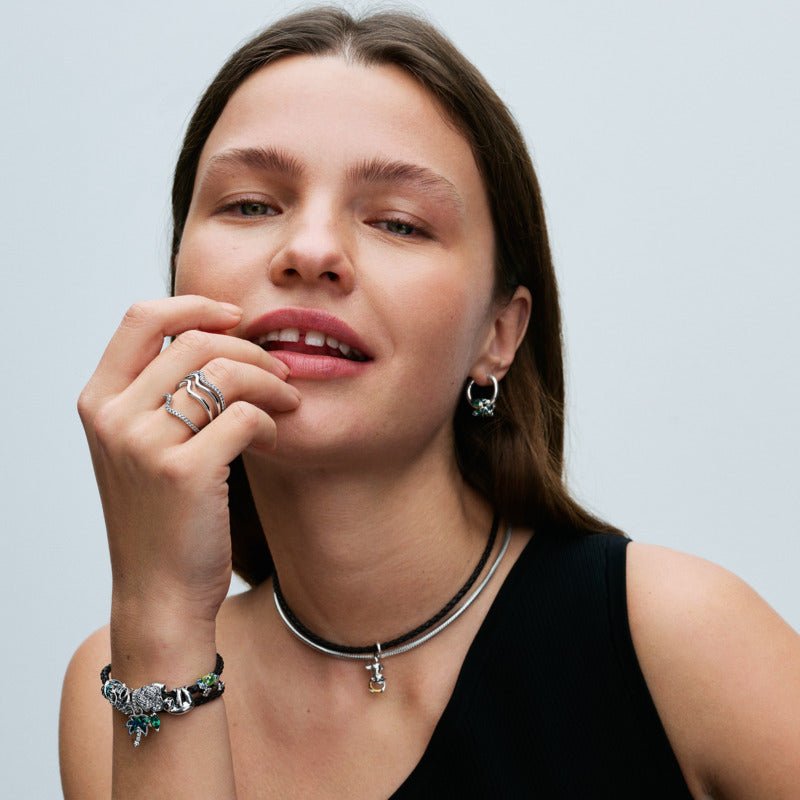 Divtoņu kustīgā pērtiķēna amulets