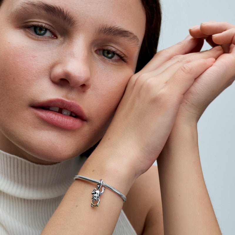 Divtoņu kustīgā pērtiķēna amulets