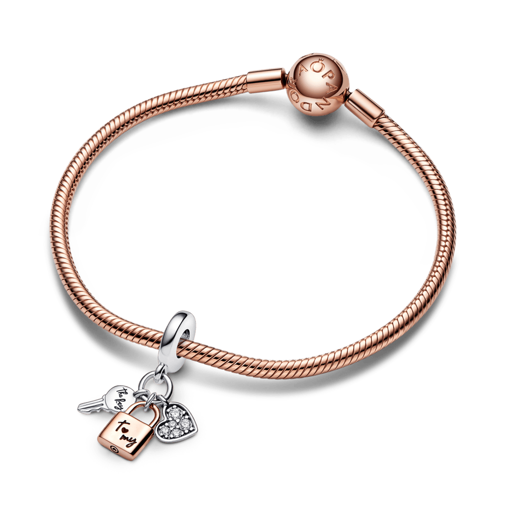 Piekarināmais divtoņu atslēgas, slēdzenes un sirds trīs elementu amulets