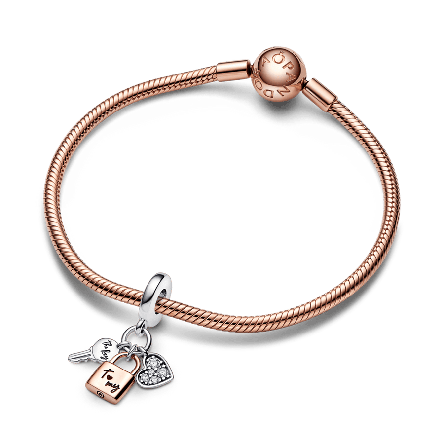 Piekarināmais divtoņu atslēgas, slēdzenes un sirds trīs elementu amulets