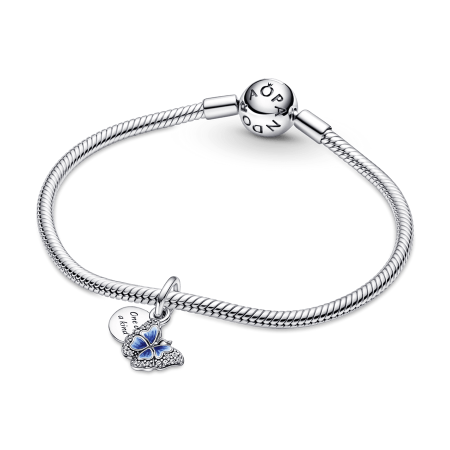 Piekarināmais zilā tauriņa un pēdiņu amulets