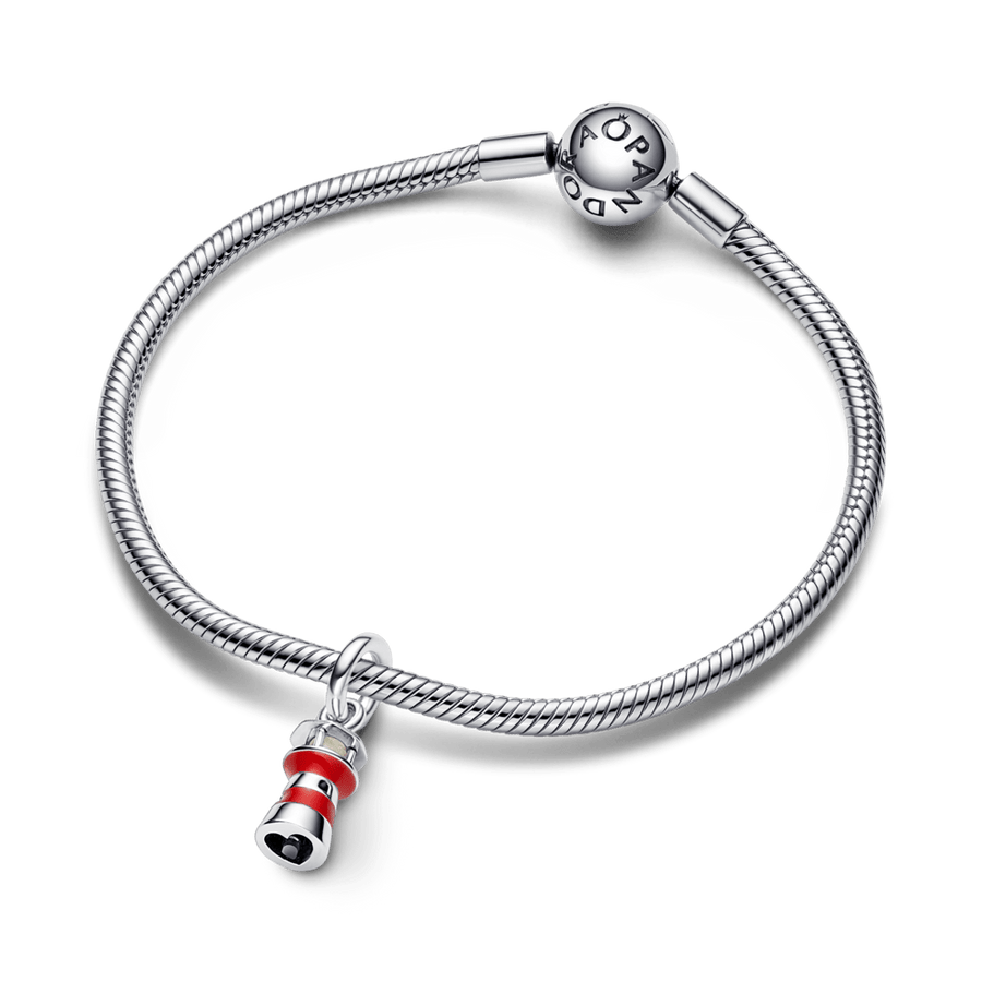 Tumsā spīdošas bākas amulets