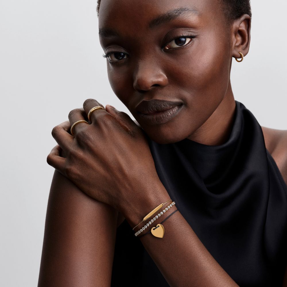 Gravējamā sirds formas melnas auklas slīdņa aproce