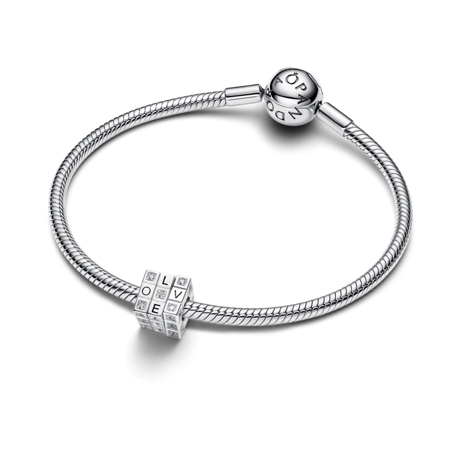 Kustīgais Toy Cube amulets