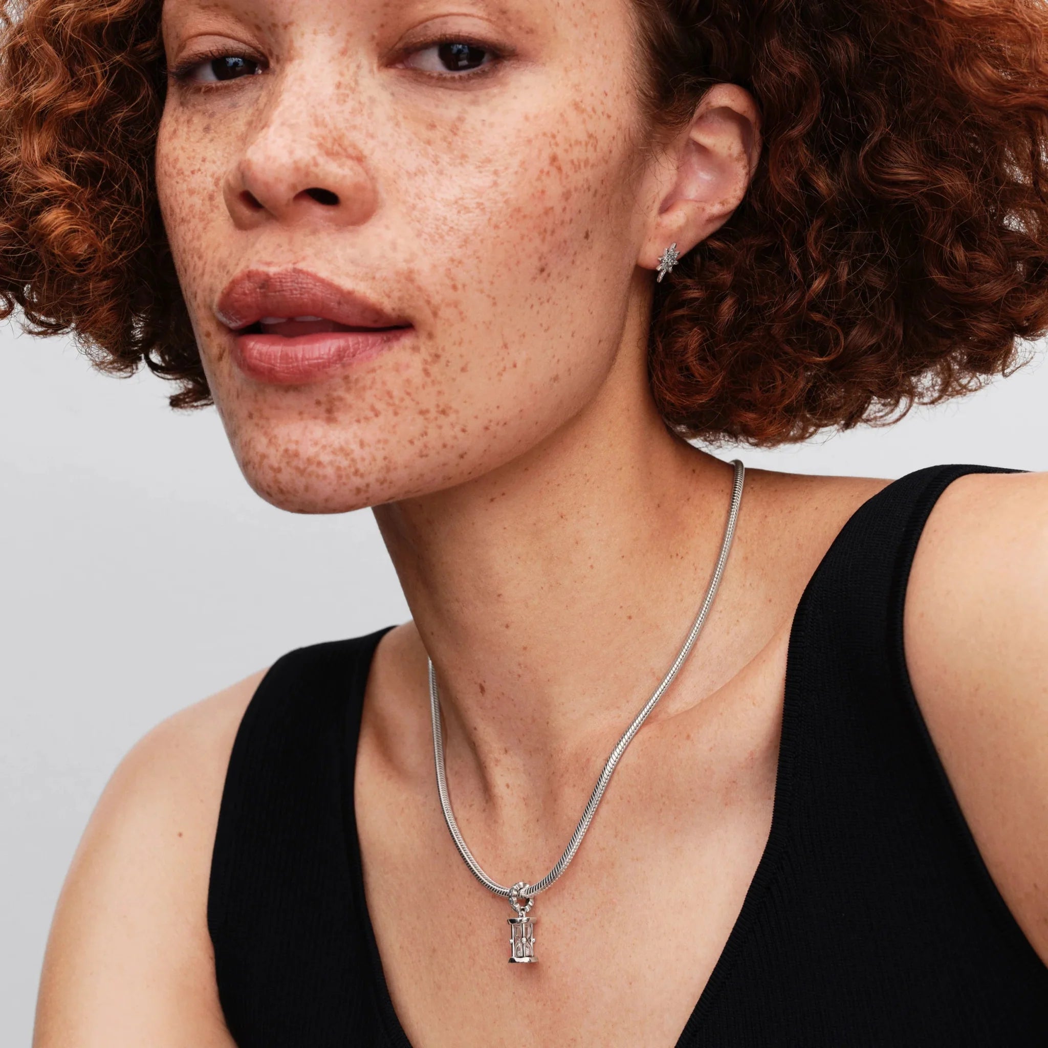 Smilšu pulksteņa amulets