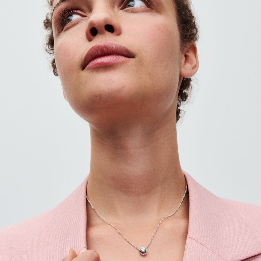 Dāvanu komplekts: Kaklarota ar kulonu, kas dekorēts ar dzirkstošo akmeņu oreolu & Auskari ar dzirkstošo akmeņu oreolu