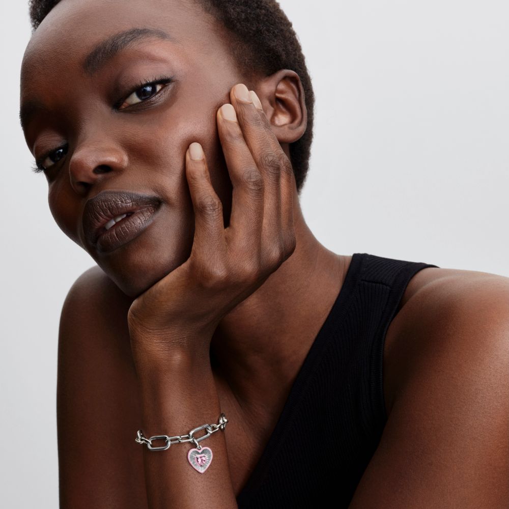 Starojošs rozā sirds medaljona amulets