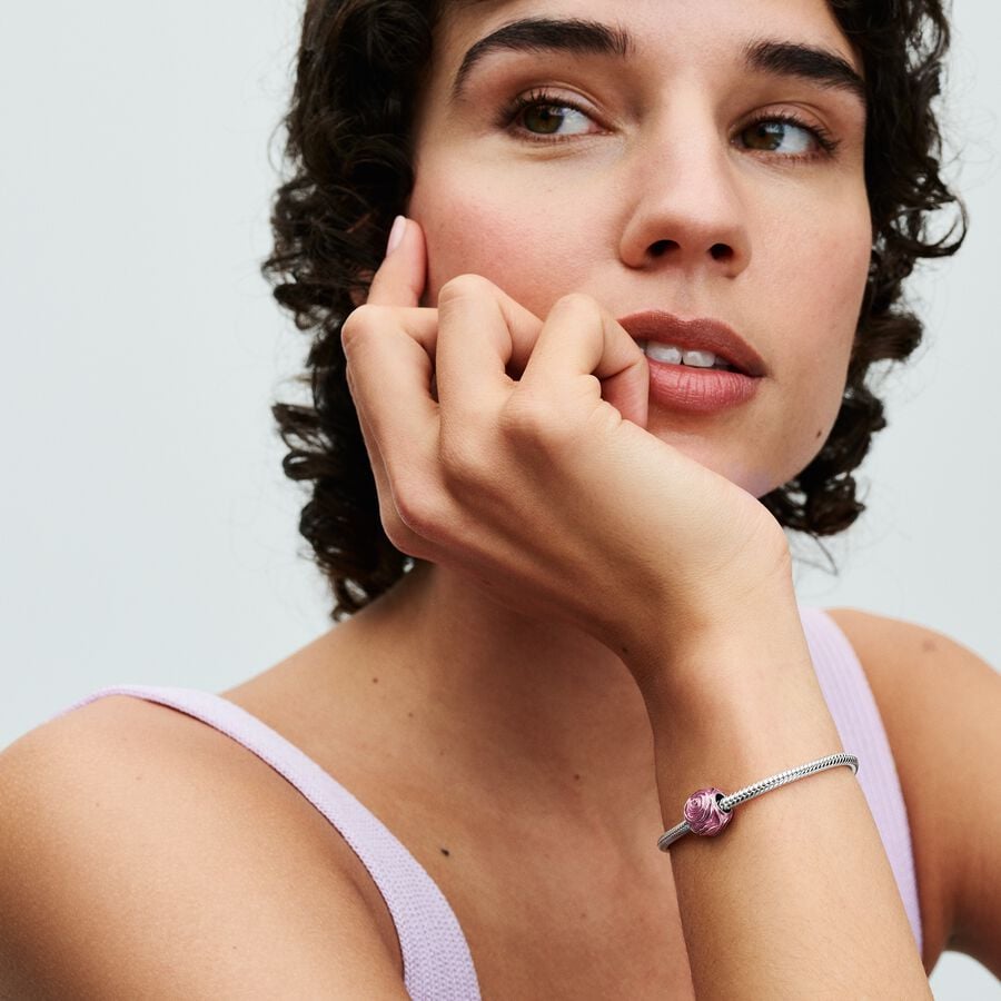 Rozā rozes zieda amulets