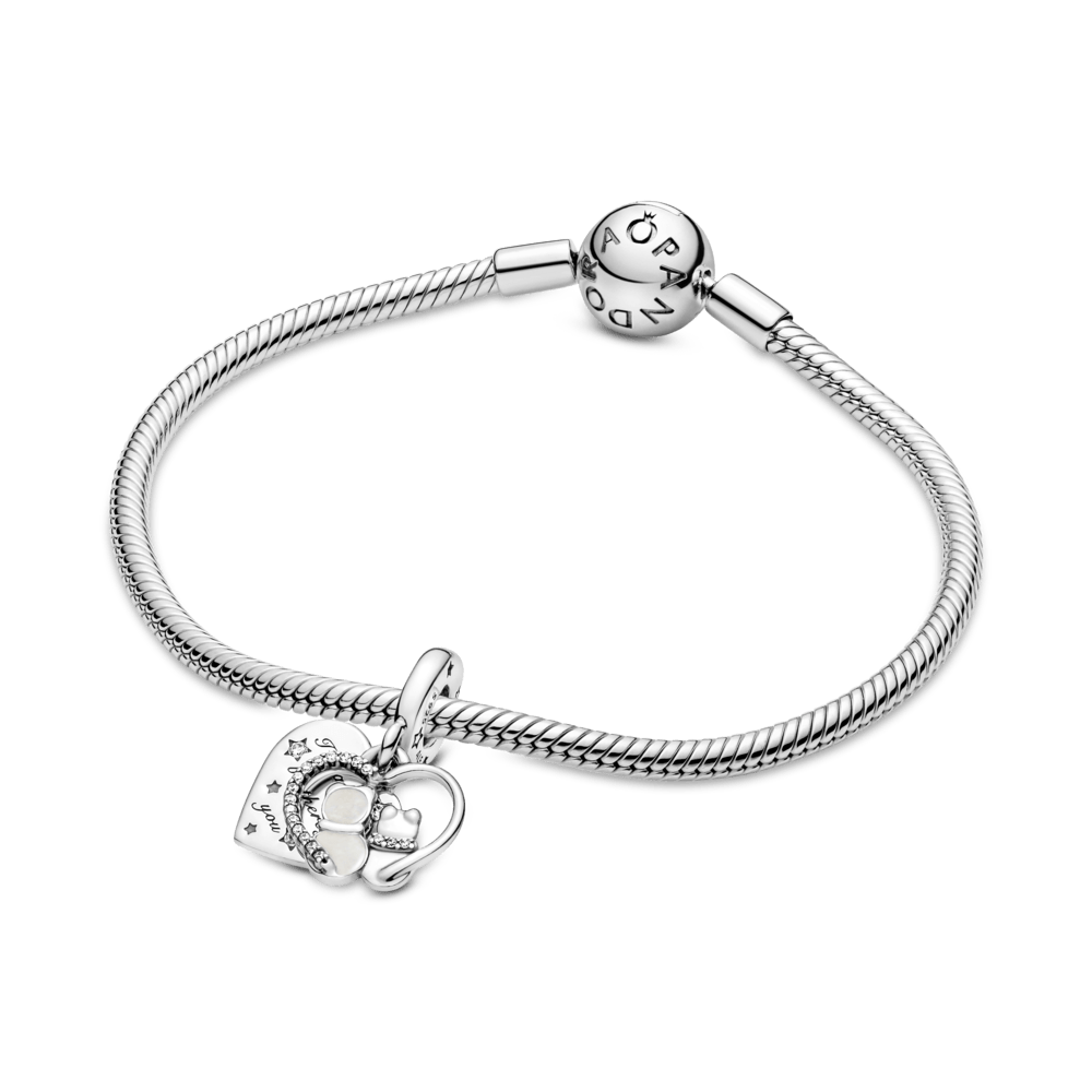 Piekarināmais amulets ar kaķu un sirds motīvu