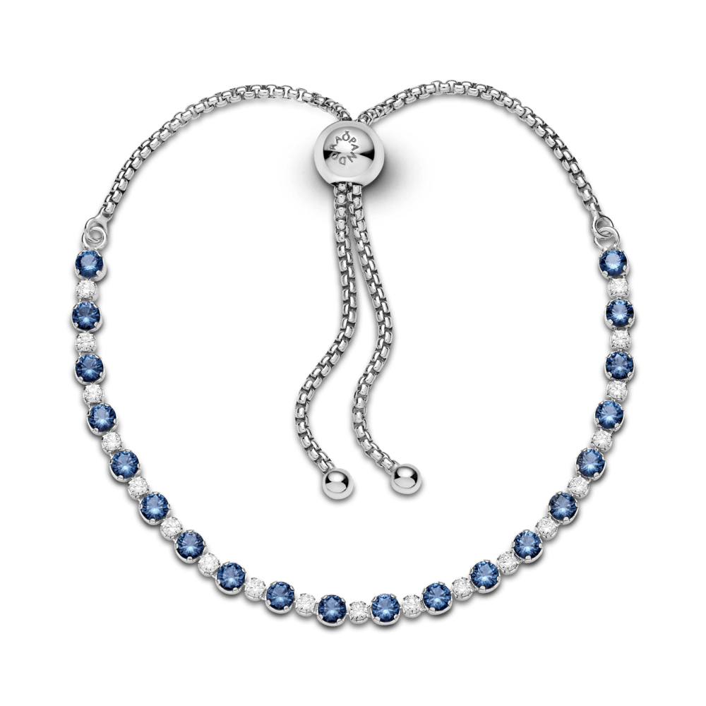 Zilo un dzidri mirdzošo akmeņu rokassprādze ar savelkamu aizdari