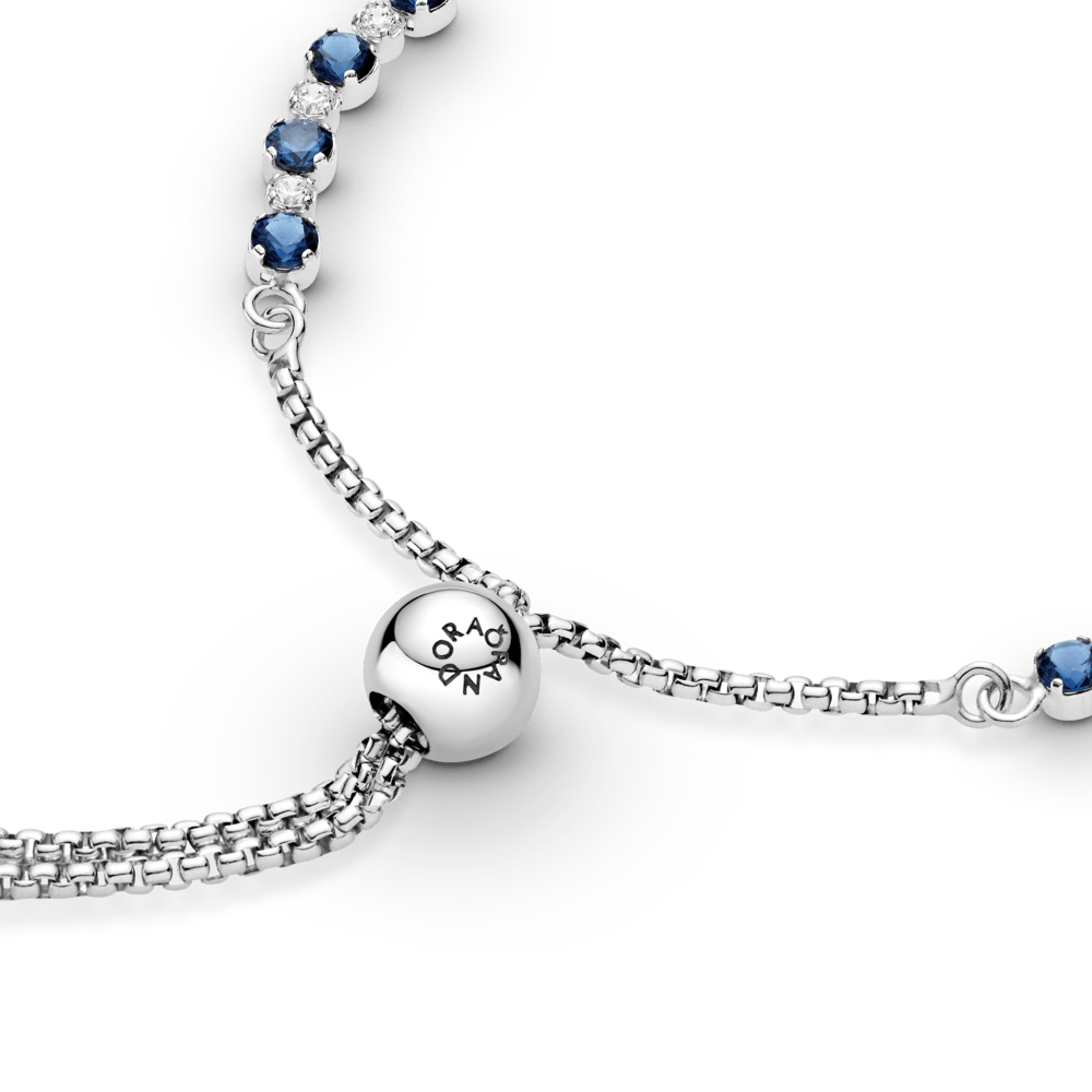 Zilo un dzidri mirdzošo akmeņu rokassprādze ar savelkamu aizdari