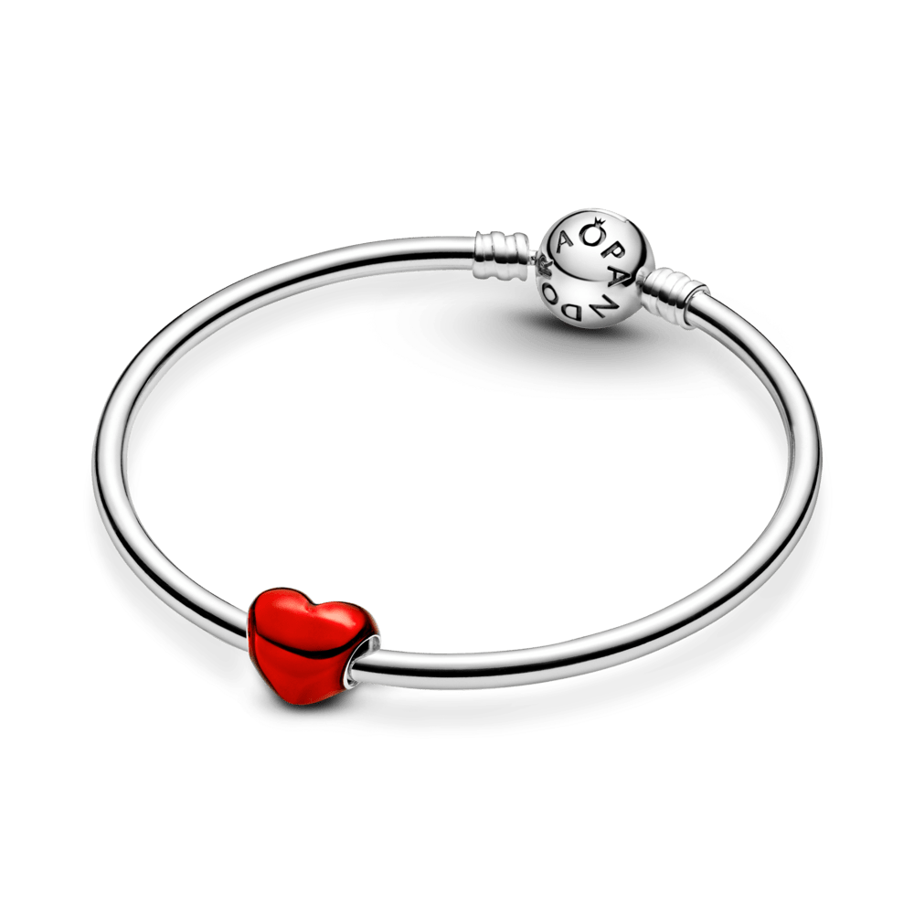 Metāliski sarkanais sirds formas amulets