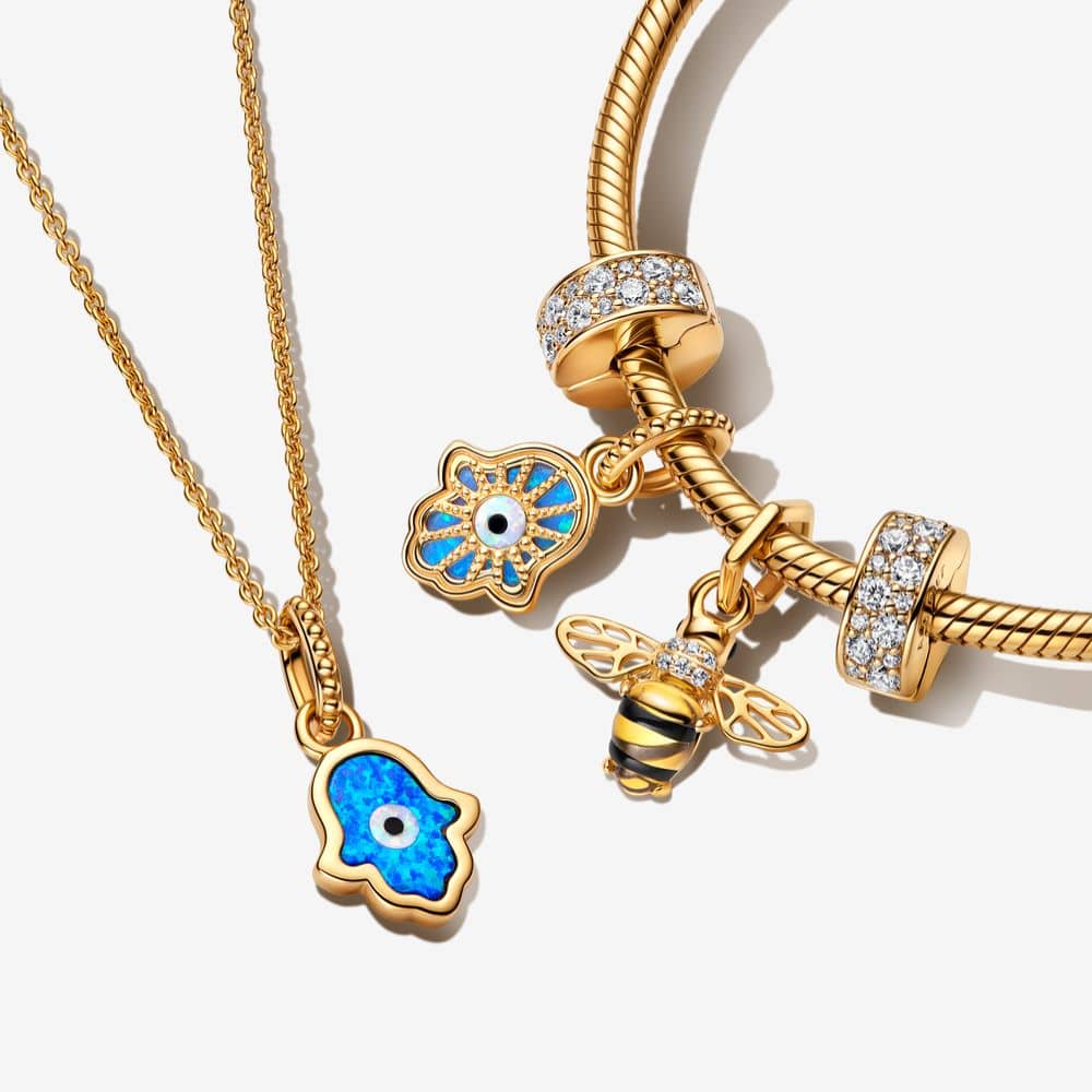 Piekarināmais mirdzoši zilais Hamsa rokas amulets