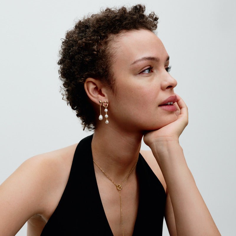 Organiskas formas apļveida T formas kaklarota