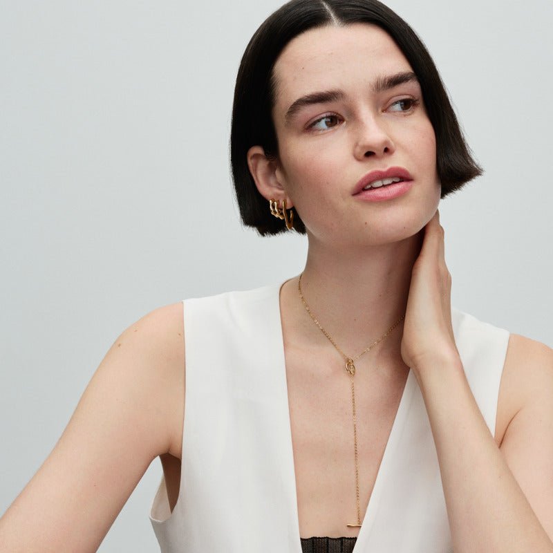 Organiskas formas apļveida T formas kaklarota