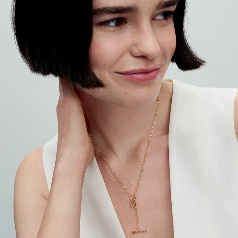 Organiskas formas apļveida T formas kaklarota