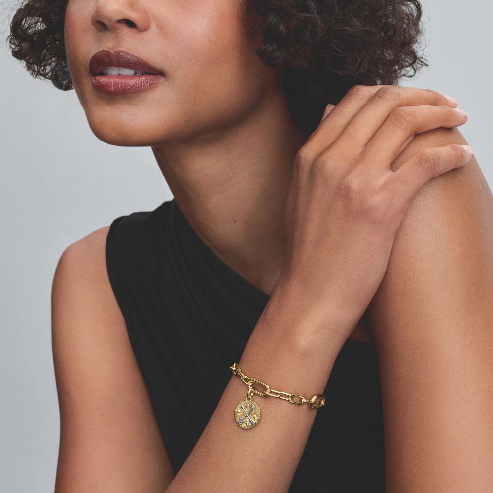 Šķērsojošo bultiņu medaljona amulets