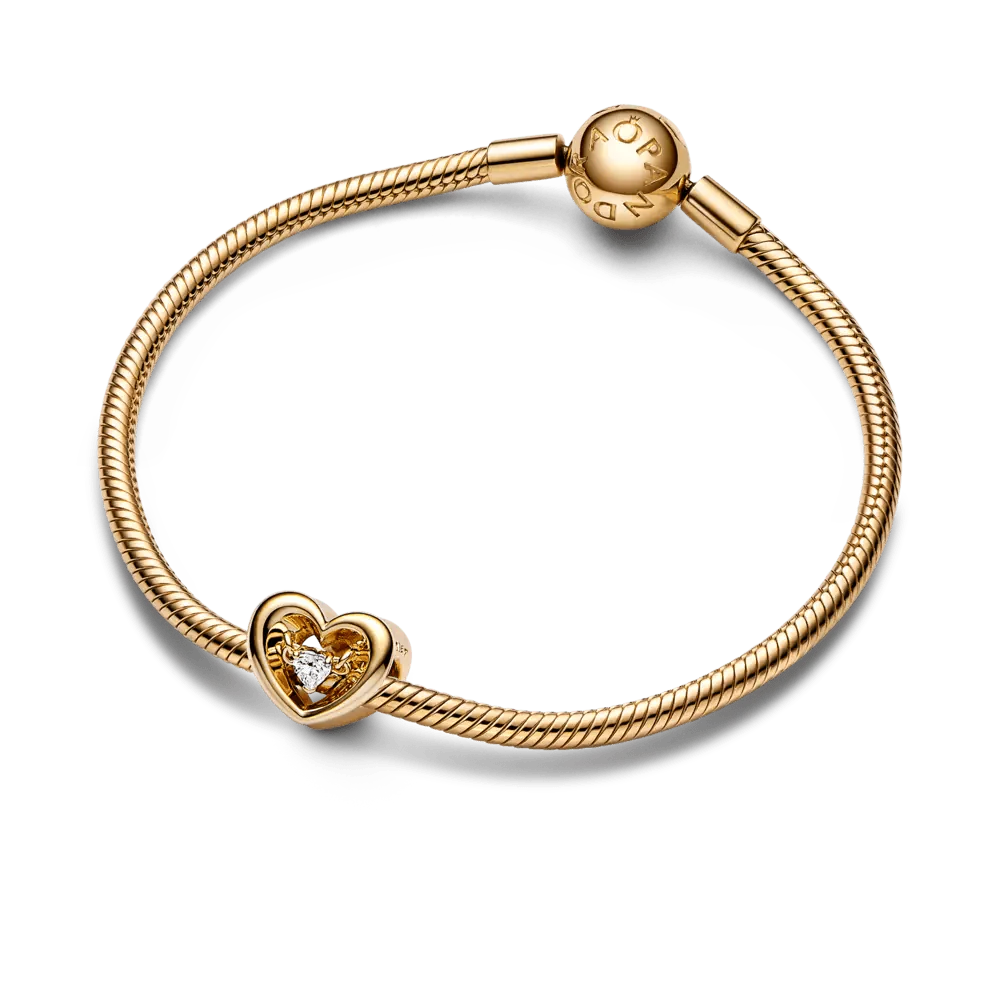 Mirdzošais sirds un peldošā akmens amulets