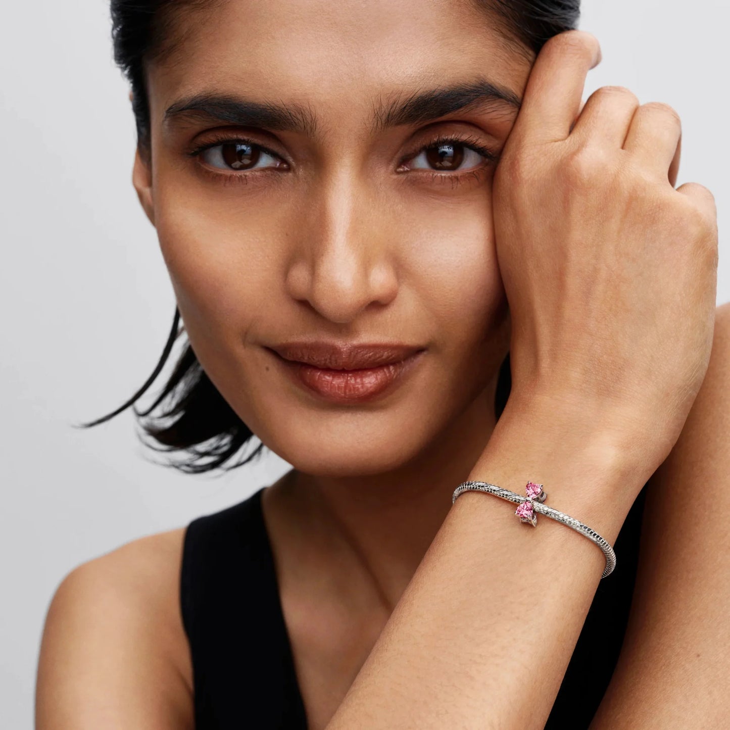 Rozā bantīšu amulets