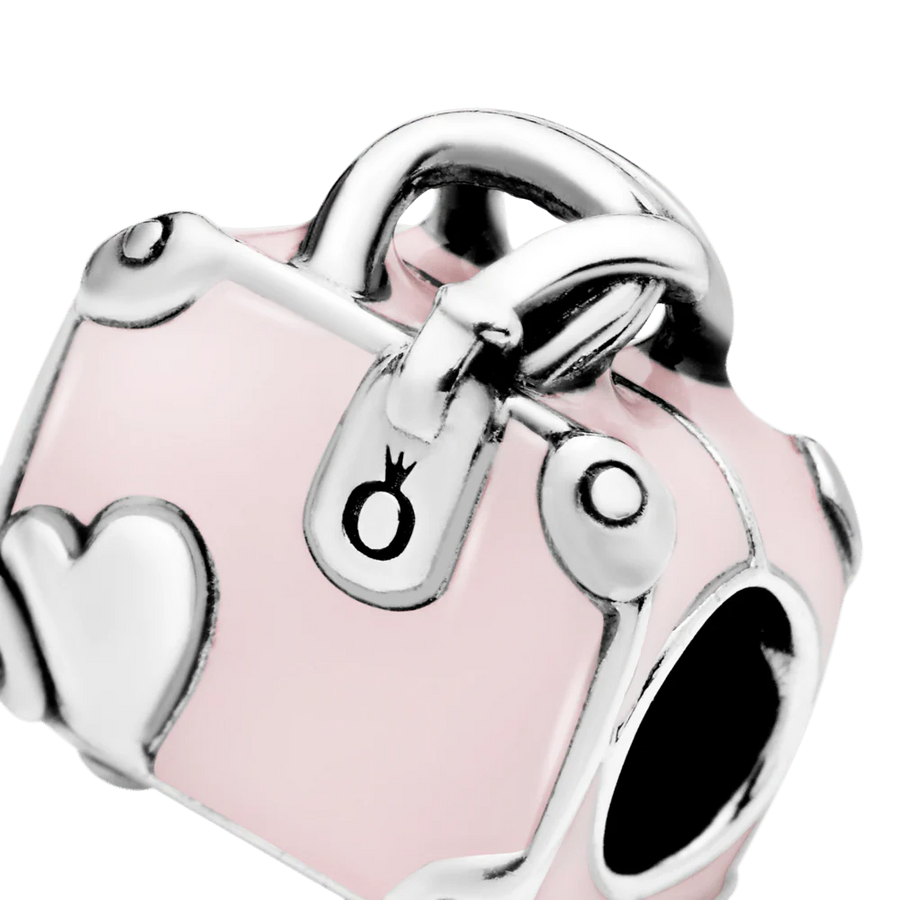 Rozā ceļojuma somas amulets