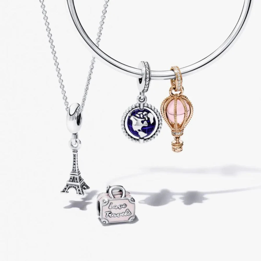 Rozā ceļojuma somas amulets