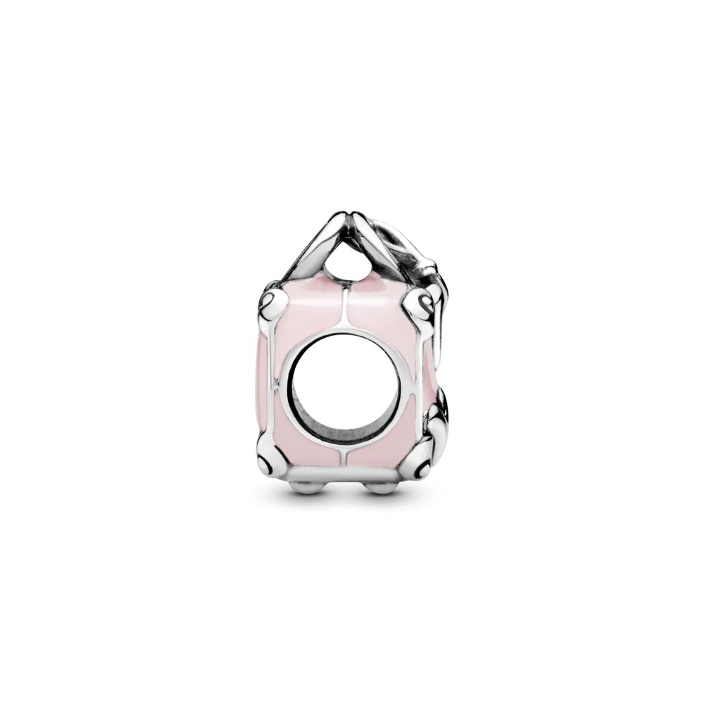 Rozā ceļojuma somas amulets