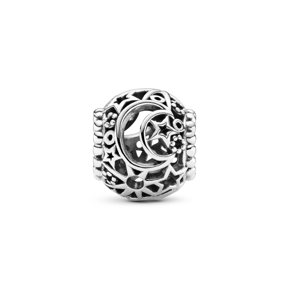 Saules, zvaigžņu un mēness amulets ažūra rakstā