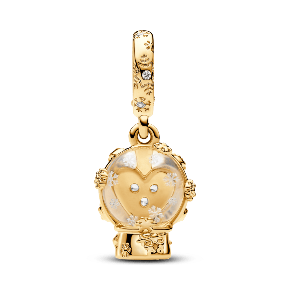 Sirds sniegpārsliņas un sniega globusa piekariņš