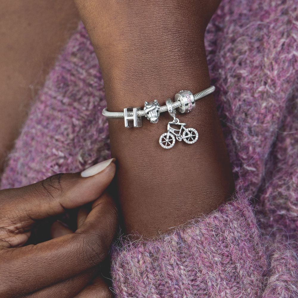 Rozā dzirkstošs amulets