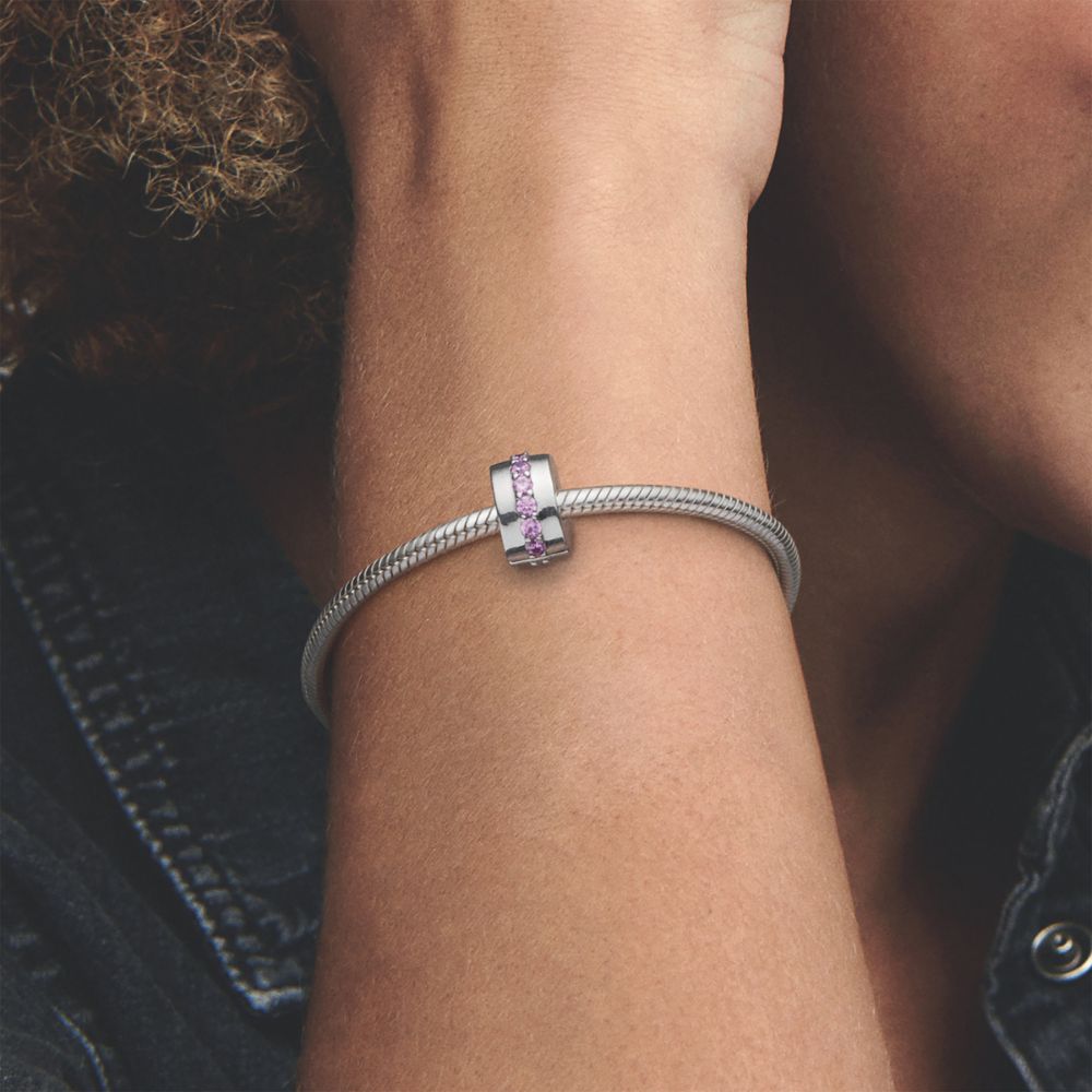 Rozā dzirkstošs amulets