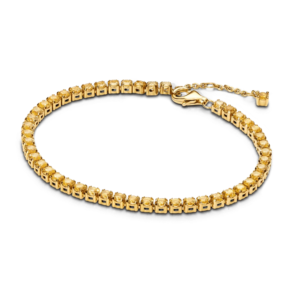 Spīdīga dzeltena tenisa rokassprādze