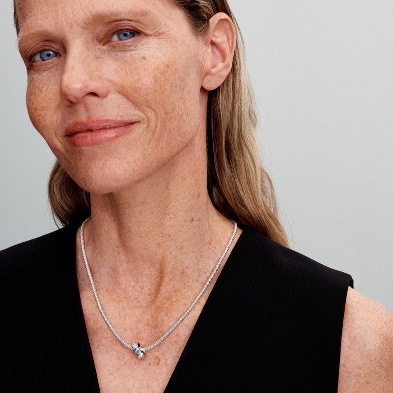 Mirdzošā tauriņa amulets