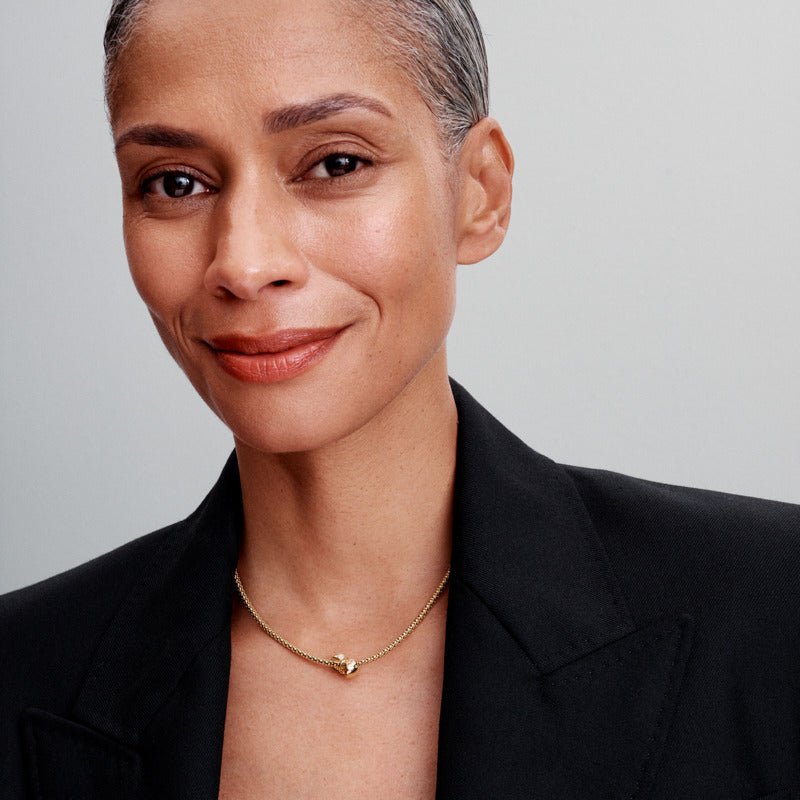 Mirdzošs tauriņa amulets