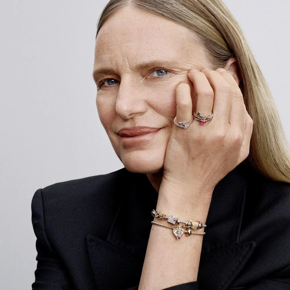 Mirdzošais bultas gredzens