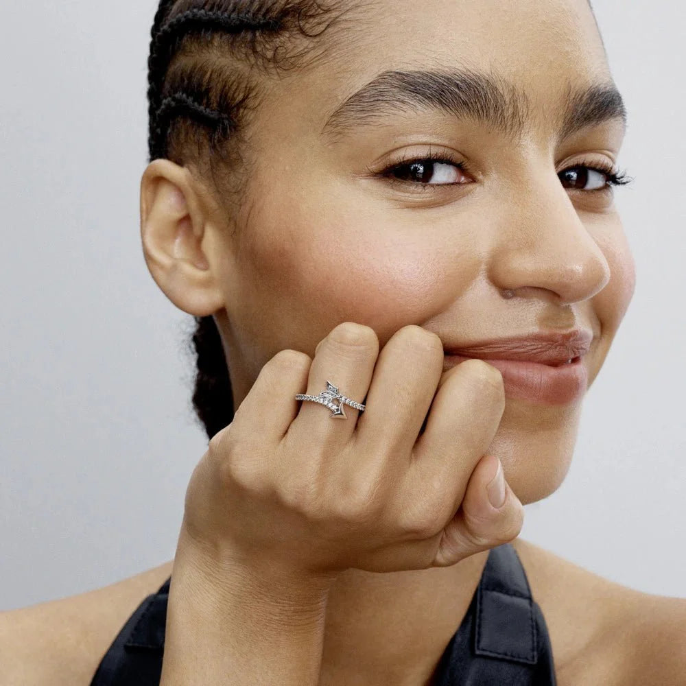 Mirdzošais bultas gredzens